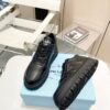 sy_no_F888DBA842C1C7C1EAAE3B5BA78B5DE2_1 Prada All-Black Triangle Logo Chunky Platform Sneaker