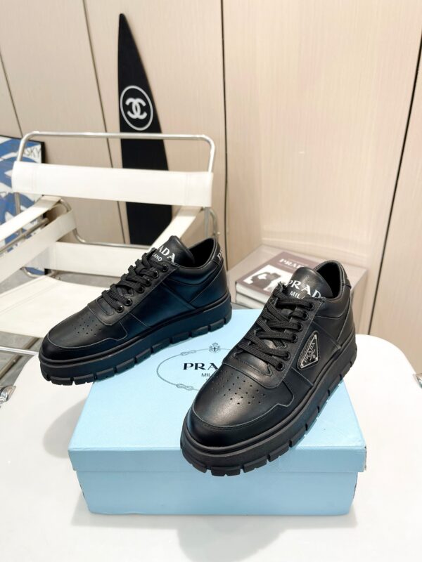 sy_no_F888DBA842C1C7C1EAAE3B5BA78B5DE2_2 Prada All-Black Triangle Logo Chunky Platform Sneaker