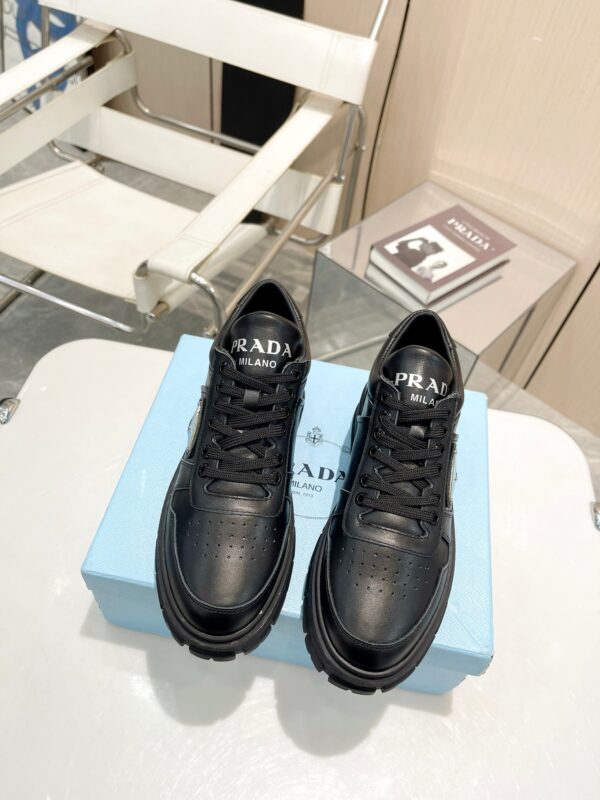 sy_no_F888DBA842C1C7C1EAAE3B5BA78B5DE2_3 Prada All-Black Triangle Logo Chunky Platform Sneaker
