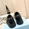 sy_no_F888DBA842C1C7C1EAAE3B5BA78B5DE2_4 Prada All-Black Triangle Logo Chunky Platform Sneaker