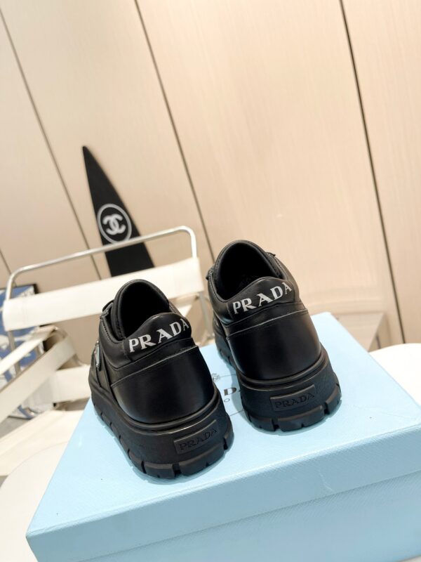 sy_no_F888DBA842C1C7C1EAAE3B5BA78B5DE2_4 Prada All-Black Triangle Logo Chunky Platform Sneaker