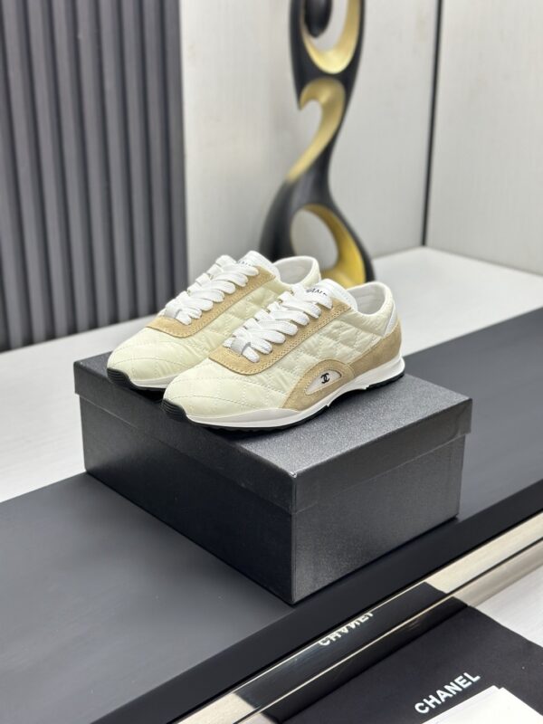 sy_no_F952003BF4357B892F7023CF683CD48F_0 Chanel Beige Quilted & Khaki Suede Low-Top Sneaker Beige-Quilted-Sneaker
