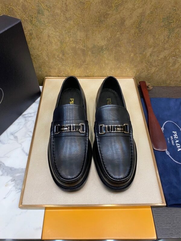 sy_no_FE576F609BD0497C35E391C4D1A1059C_0 Prada Black Matte Leather Metal Buckle Loafers