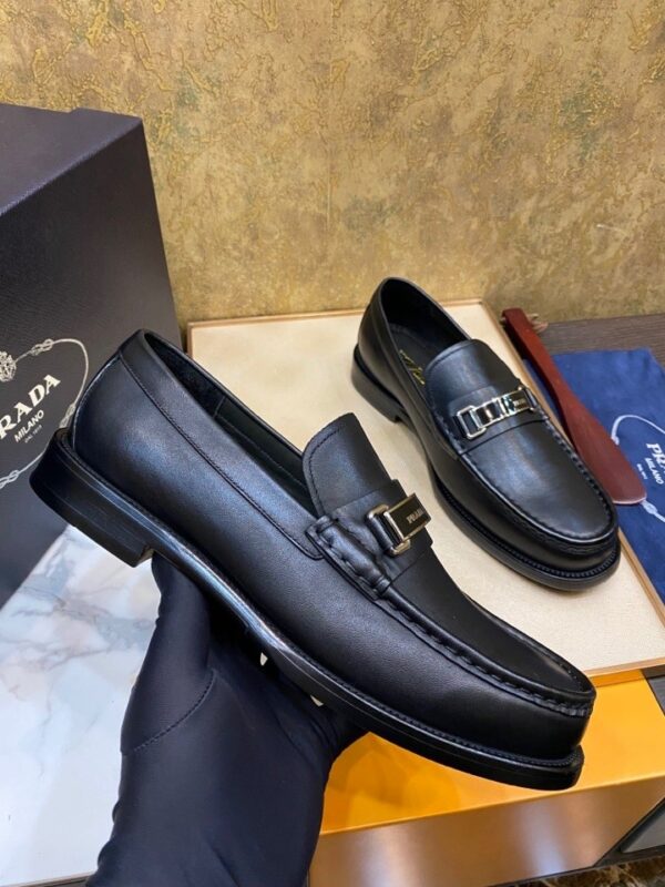sy_no_FE576F609BD0497C35E391C4D1A1059C_1 Prada Black Matte Leather Metal Buckle Loafers