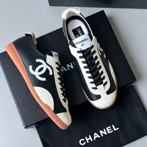 sy_no_FF3DAB3822B56F1F707AF156693F245E_0 Chanel Smooth Calfskin & Pebbled Leather Retro Trainer Black-Cream-GumSole