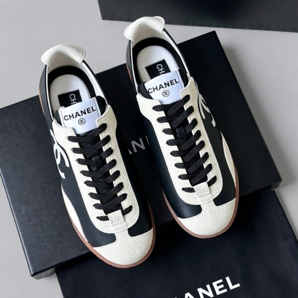 sy_no_FF3DAB3822B56F1F707AF156693F245E_1 Chanel Smooth Calfskin & Pebbled Leather Retro Trainer Black-Cream-GumSole