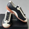 sy_no_FF3DAB3822B56F1F707AF156693F245E_2 Chanel Smooth Calfskin & Pebbled Leather Retro Trainer Black-Cream-GumSole