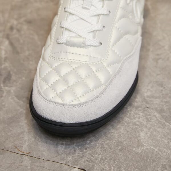 sy_no_FF6BDA0E93CD05595F46FE27C19E8E77_6 Chanel White Quilted Leather Low-Top Sneaker with Suede Detailing and Tongue Logo