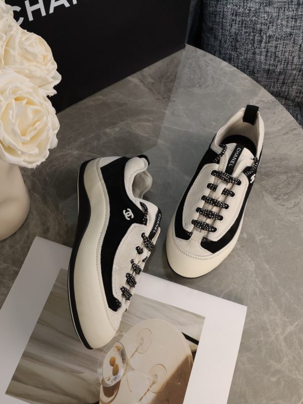 sy_no_20CDC3B79AADB57BC7D7D429FCD553D9_1 CHANEL Black & White Color-Blocked Chunky Sole Retro Trainer Sneaker
