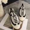 sy_no_20CDC3B79AADB57BC7D7D429FCD553D9_2 CHANEL Black & White Color-Blocked Chunky Sole Retro Trainer Sneaker