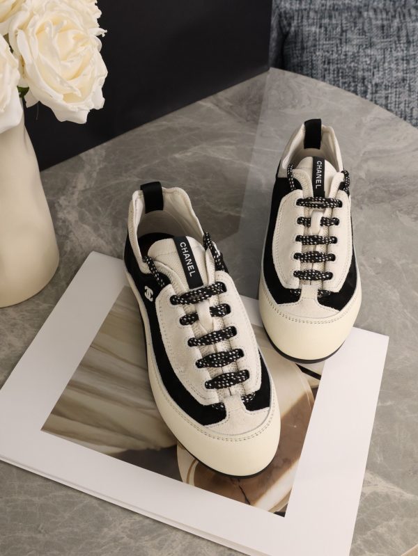sy_no_20CDC3B79AADB57BC7D7D429FCD553D9_2 CHANEL Black & White Color-Blocked Chunky Sole Retro Trainer Sneaker