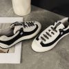 sy_no_20CDC3B79AADB57BC7D7D429FCD553D9_4 CHANEL Black & White Color-Blocked Chunky Sole Retro Trainer Sneaker