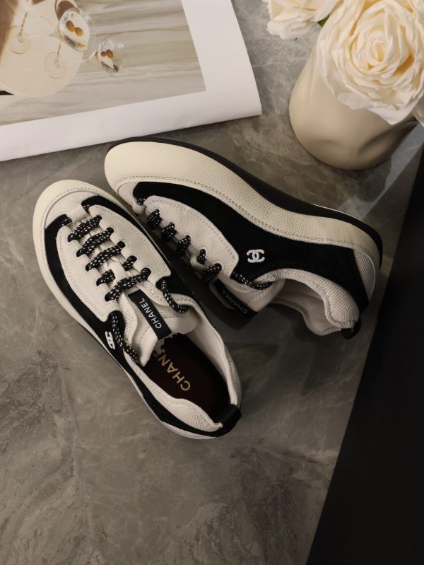sy_no_20CDC3B79AADB57BC7D7D429FCD553D9_5 CHANEL Black & White Color-Blocked Chunky Sole Retro Trainer Sneaker
