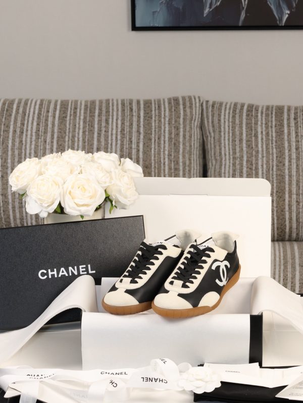 sy_no_77EA8EB622D1FD19F9B11B70AF8ED608_0 CHANEL Black & White Color-Blocked Retro Trainer Sneaker