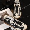 sy_no_77EA8EB622D1FD19F9B11B70AF8ED608_1 CHANEL Black & White Color-Blocked Retro Trainer Sneaker