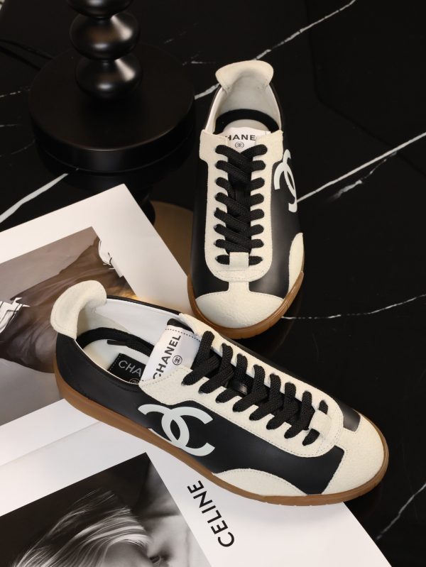 sy_no_77EA8EB622D1FD19F9B11B70AF8ED608_1 CHANEL Black & White Color-Blocked Retro Trainer Sneaker