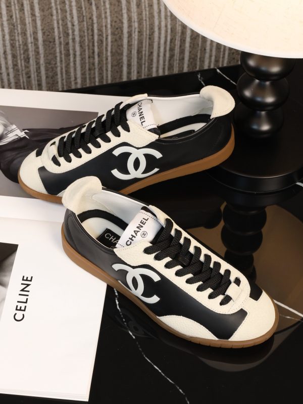 sy_no_77EA8EB622D1FD19F9B11B70AF8ED608_3 CHANEL Black & White Color-Blocked Retro Trainer Sneaker