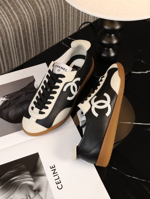 sy_no_77EA8EB622D1FD19F9B11B70AF8ED608_4 CHANEL Black & White Color-Blocked Retro Trainer Sneaker