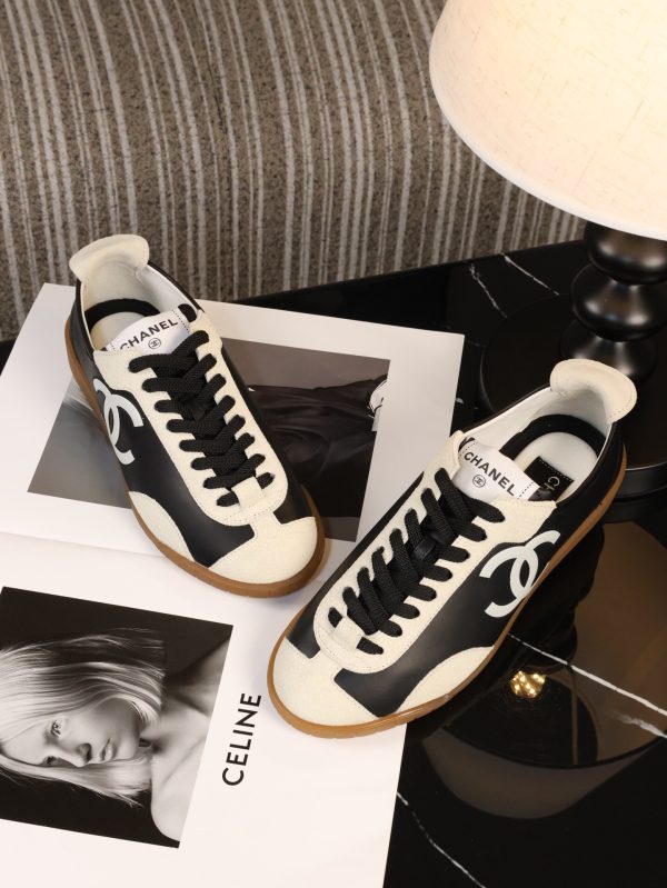 sy_no_77EA8EB622D1FD19F9B11B70AF8ED608_6 CHANEL Black & White Color-Blocked Retro Trainer Sneaker