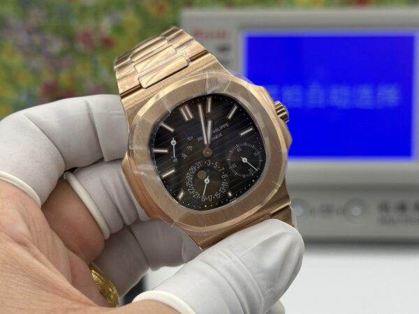 sy_no_8A136512076C275BB717D7BABEF6D690_1 Patek Philippe Nautilus 5712/1R-001 Rose Gold Brown Dial Moonphase Watch