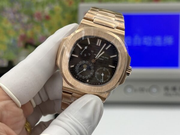 sy_no_8A136512076C275BB717D7BABEF6D690_2 Patek Philippe Nautilus 5712/1R-001 Rose Gold Brown Dial Moonphase Watch