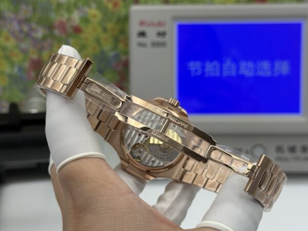 sy_no_8A136512076C275BB717D7BABEF6D690_7 Patek Philippe Nautilus 5712/1R-001 Rose Gold Brown Dial Moonphase Watch