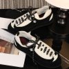sy_no_D213CC8D5E4908BB5C7AE4998A3E7EBD_1 CHANEL Black & White Two-Tone Retro Trainer Sneaker