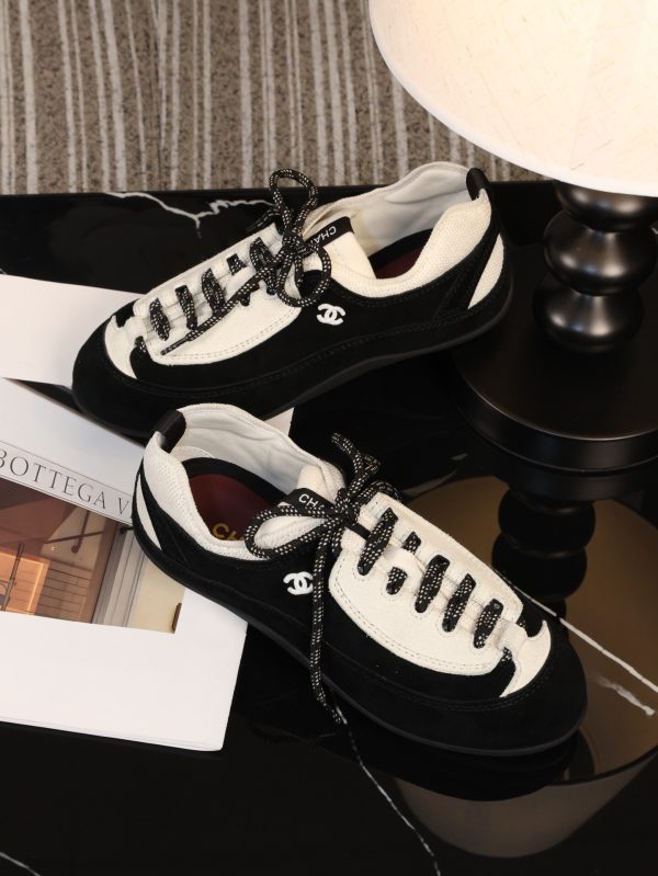sy_no_D213CC8D5E4908BB5C7AE4998A3E7EBD_1 CHANEL Black & White Two-Tone Retro Trainer Sneaker