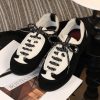 sy_no_D213CC8D5E4908BB5C7AE4998A3E7EBD_2 CHANEL Black & White Two-Tone Retro Trainer Sneaker