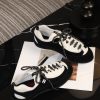 sy_no_D213CC8D5E4908BB5C7AE4998A3E7EBD_3 CHANEL Black & White Two-Tone Retro Trainer Sneaker