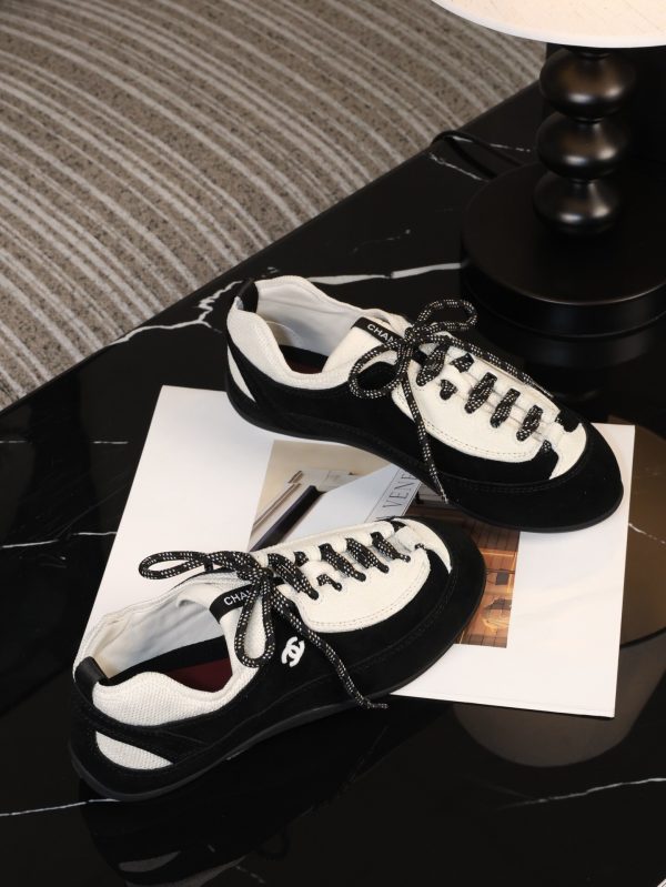 sy_no_D213CC8D5E4908BB5C7AE4998A3E7EBD_3 CHANEL Black & White Two-Tone Retro Trainer Sneaker