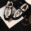 sy_no_D213CC8D5E4908BB5C7AE4998A3E7EBD_5 CHANEL Black & White Two-Tone Retro Trainer Sneaker