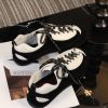 sy_no_D213CC8D5E4908BB5C7AE4998A3E7EBD_6 CHANEL Black & White Two-Tone Retro Trainer Sneaker