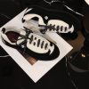 sy_no_D213CC8D5E4908BB5C7AE4998A3E7EBD_7 CHANEL Black & White Two-Tone Retro Trainer Sneaker